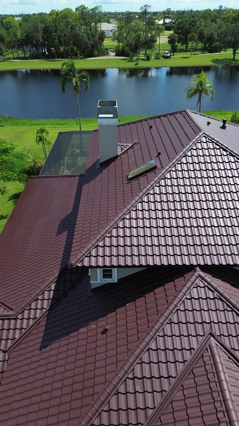 Worthouse metal tile roof in burgundy — Horizon SWFL install