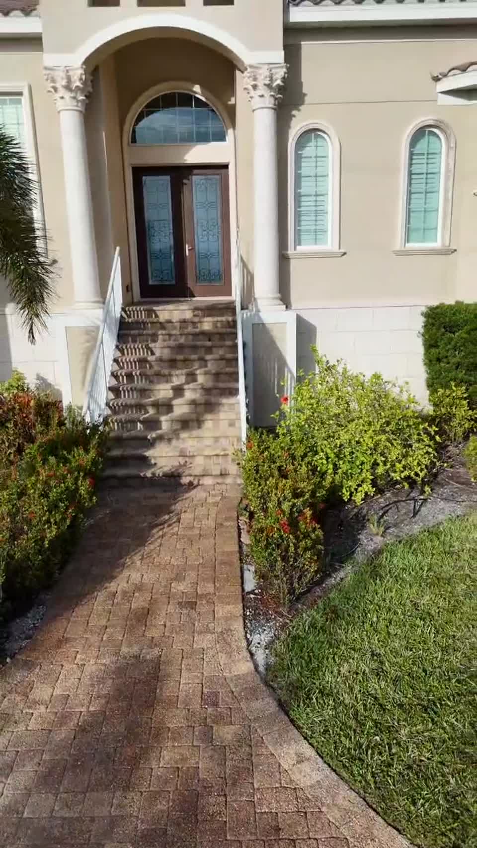 Luxury Mediterranean entry and tile roof aesthetic Naples Florida area